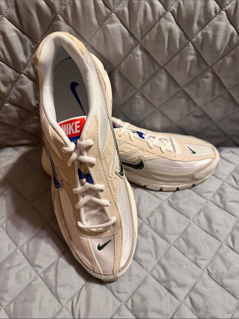 Nike Women’s Cream and White Athletic Sneakers with Blue and Green Swooshes